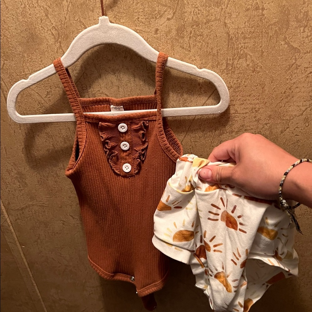 6-9 month boutique bummie shorts and tank my favorite! Great condition!